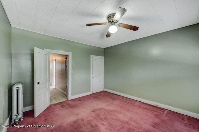 126-128 S Rebecca Ave S, Scranton, PA 18504 - unfurnished bedroom with radiator heating unit, carpet flooring, baseboards, and ceiling fan