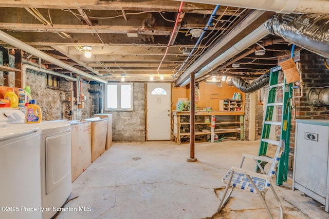 basement featuring washer and clothes dryer