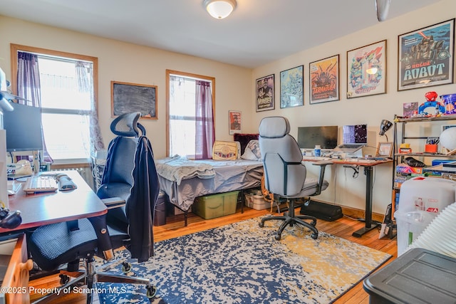 office space with wood finished floors