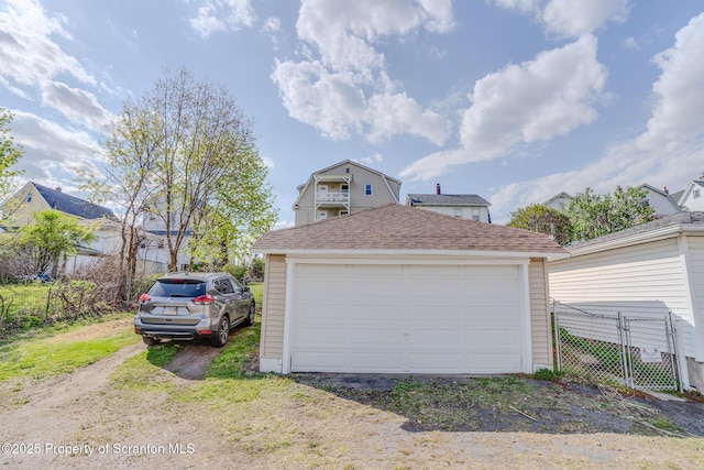 detached garage with fence