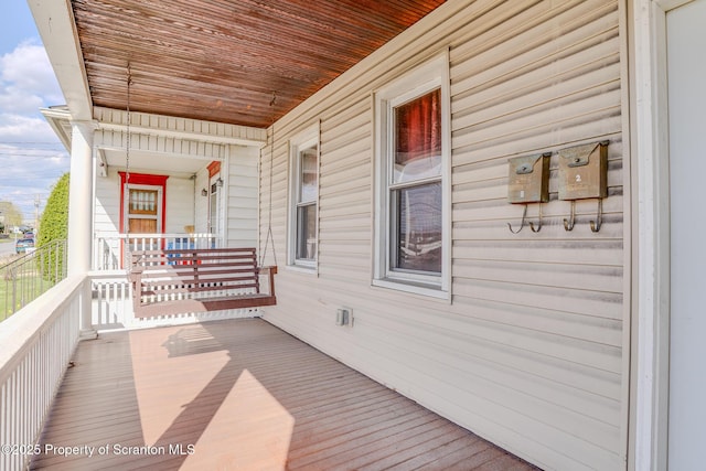 wooden deck with covered porch