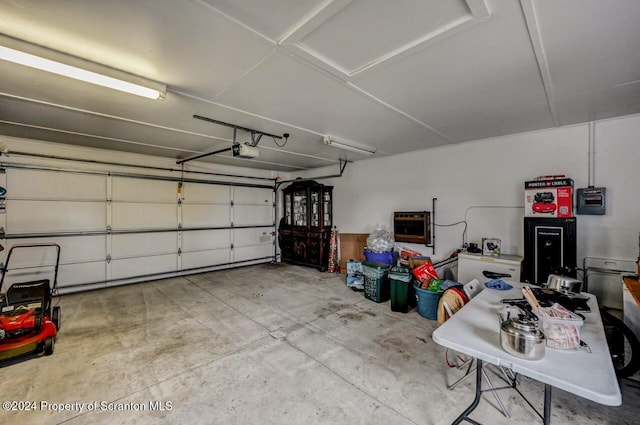 garage featuring a garage door opener