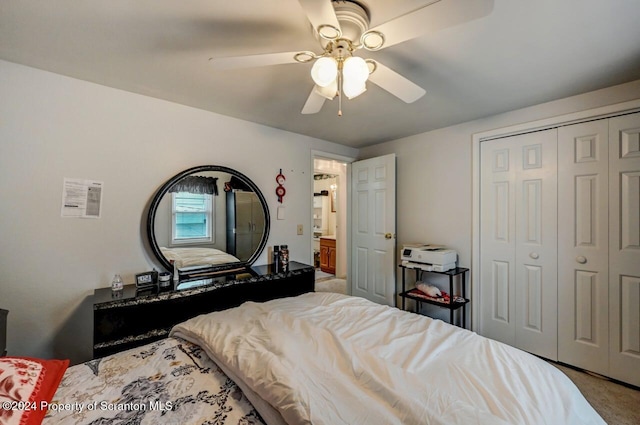 bedroom with carpet, ceiling fan, and a closet