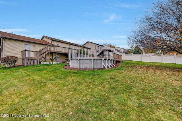 view of yard with a deck