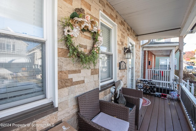 wooden deck with covered porch