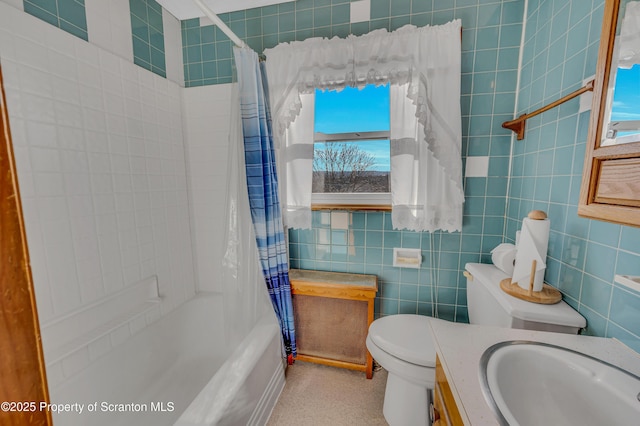 full bathroom featuring tile walls, vanity, toilet, and shower / bathtub combination with curtain