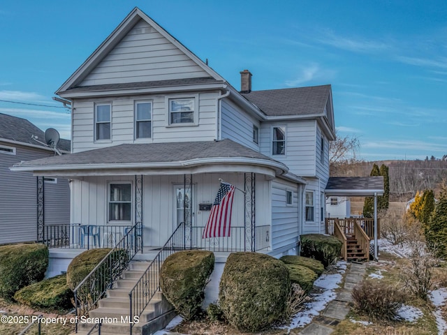 view of property with covered porch