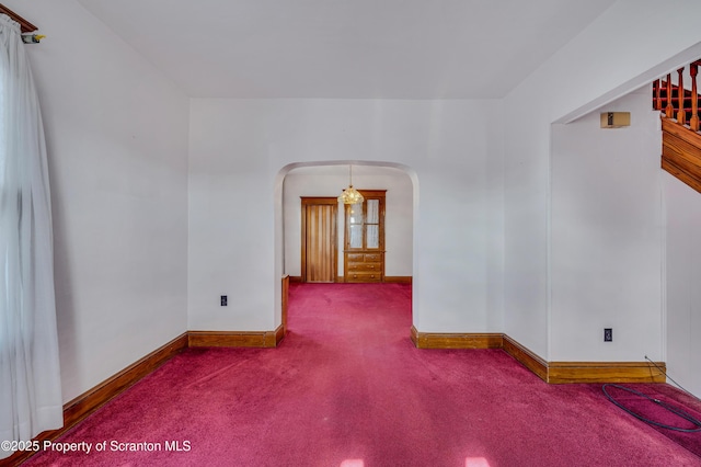 unfurnished room featuring carpet floors