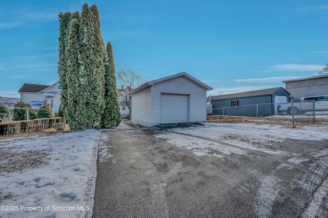 view of snow covered garage