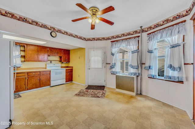 kitchen with ceiling fan and white appliances