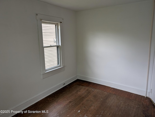 430 14th Ave, Scranton, PA 18504 - empty room with dark wood finished floors, baseboards, and plenty of natural light