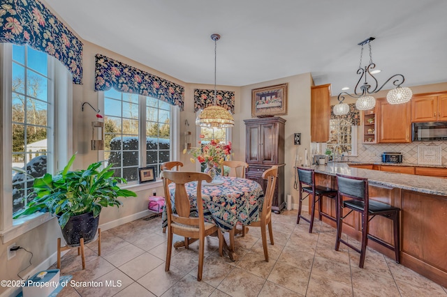 view of tiled dining space