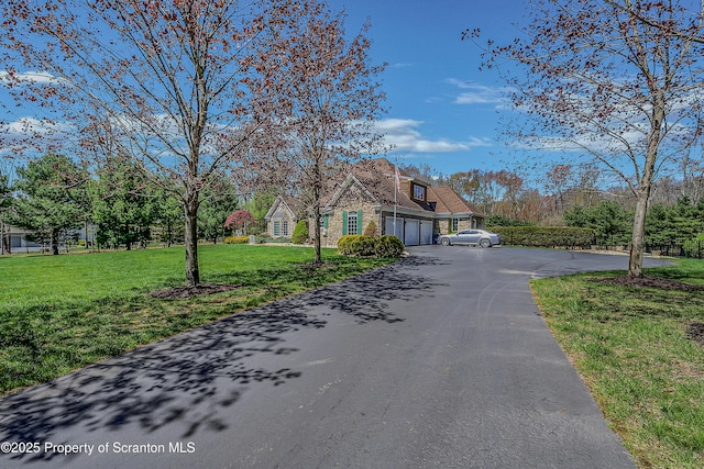 8 Eight Iron Dr, Mountaintop, PA 18707 - view of front facade featuring asphalt driveway and a front yard