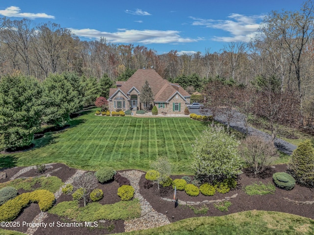 8 Eight Iron Dr, Mountaintop, PA 18707 - view of front of house featuring a front lawn and stone siding