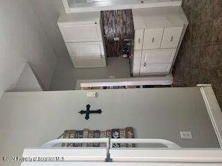 kitchen with white cabinets