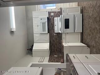 kitchen with white cabinets