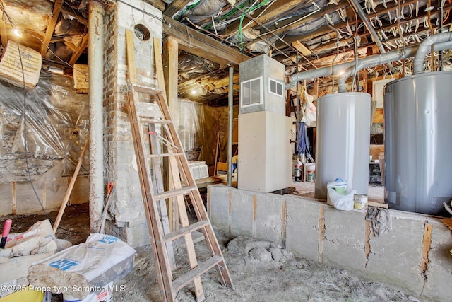 interior space with gas water heater and visible vents