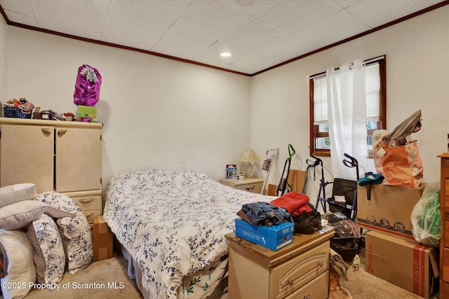 bedroom with ornamental molding, recessed lighting, and light colored carpet