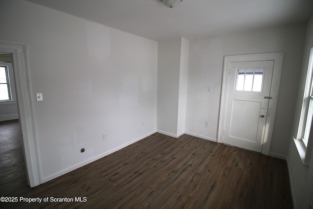 entrance foyer with dark wood-type flooring