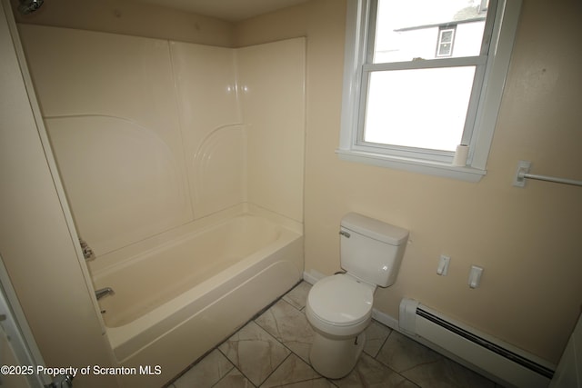 bathroom featuring toilet, baseboard heating, and washtub / shower combination