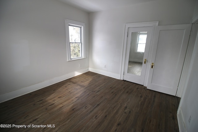 foyer entrance featuring dark hardwood / wood-style flooring