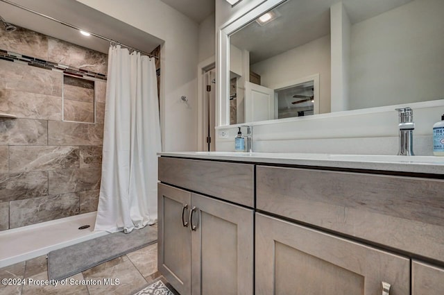 bathroom featuring vanity and walk in shower