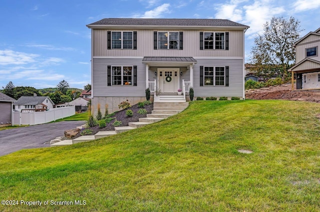 front of property featuring a front yard