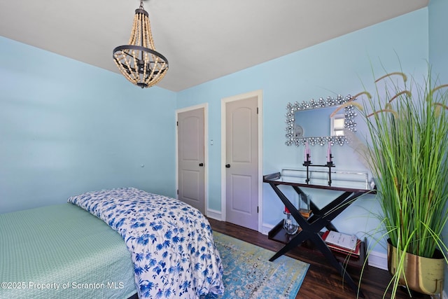 805 E Mountain Rd, Scranton, PA 18505 - bedroom featuring wood finished floors and a chandelier