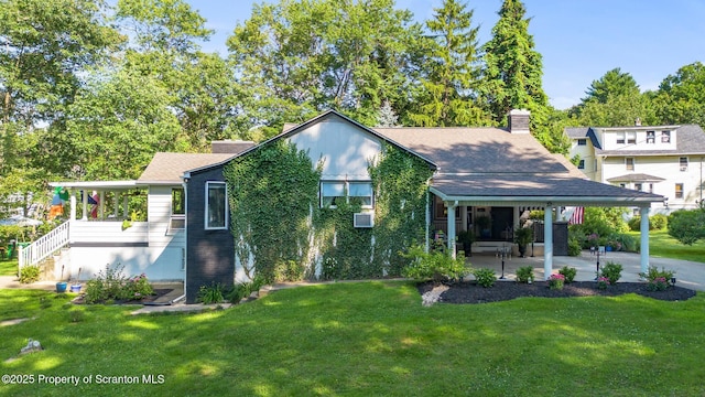 805 E Mountain Rd, Scranton, PA 18505 - view of front of property with a front yard, a chimney, and a patio area