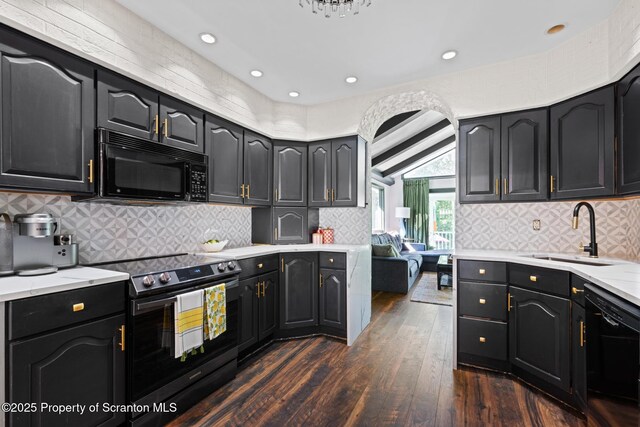 805 E Mountain Rd, Scranton, PA 18505 - kitchen with black appliances, dark wood finished floors, tasteful backsplash, recessed lighting, and dark cabinetry