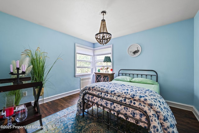 805 E Mountain Rd, Scranton, PA 18505 - bedroom featuring a chandelier, radiator, and wood finished floors