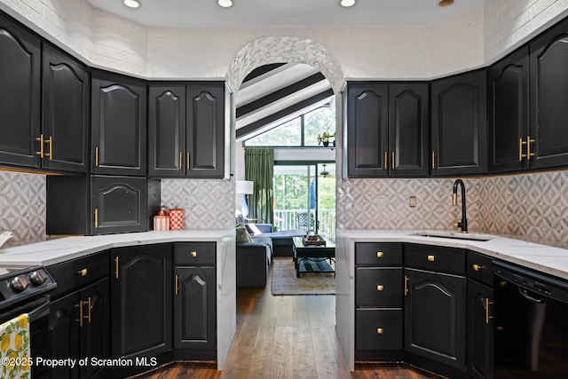 805 E Mountain Rd, Scranton, PA 18505 - kitchen with black appliances, dark wood-style floors, light stone counters, backsplash, and recessed lighting