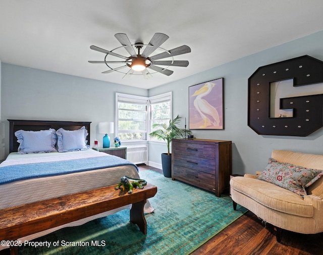 805 E Mountain Rd, Scranton, PA 18505 - bedroom featuring radiator heating unit, wood finished floors, and a ceiling fan
