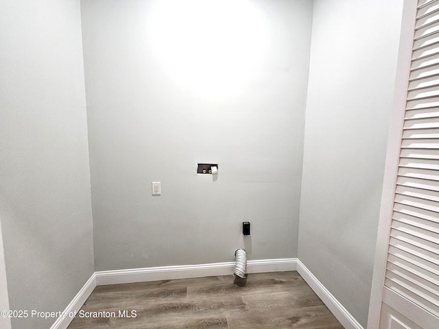laundry room with wood finished floors, laundry area, electric dryer hookup, washer hookup, and baseboards