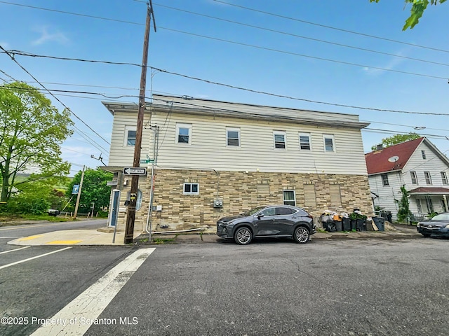 view of home's exterior featuring stone siding