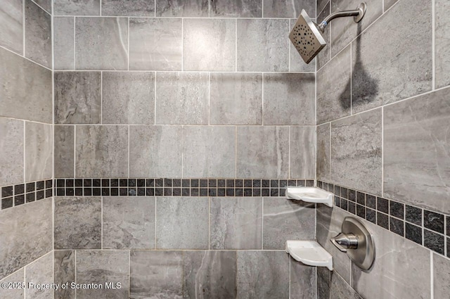 details with a tile shower