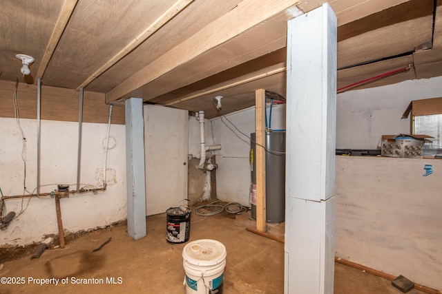 unfinished basement with gas water heater