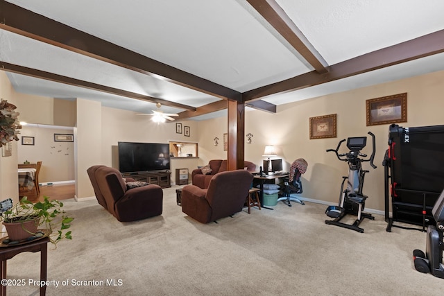 2211 Myrtle St, Scranton, PA 18510 - living area featuring beam ceiling, carpet flooring, and ceiling fan