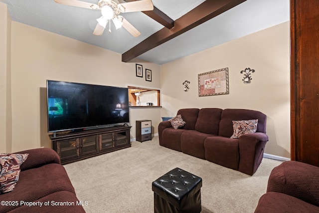 2211 Myrtle St, Scranton, PA 18510 - carpeted living room with beamed ceiling and a ceiling fan
