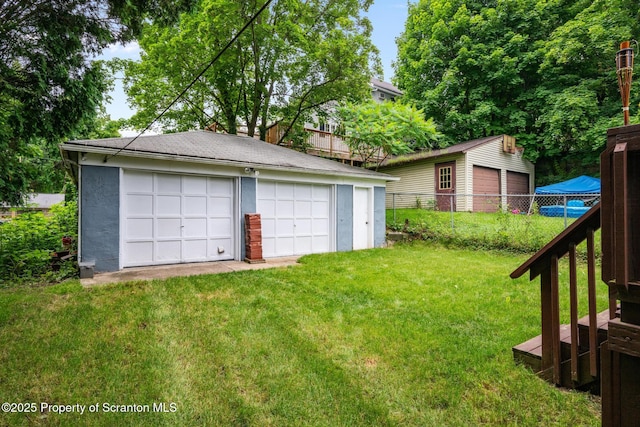2211 Myrtle St, Scranton, PA 18510 - view of yard featuring a detached garage and an outbuilding
