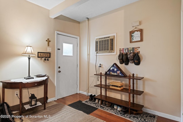 2211 Myrtle St, Scranton, PA 18510 - foyer featuring wood finished floors and a wall unit AC
