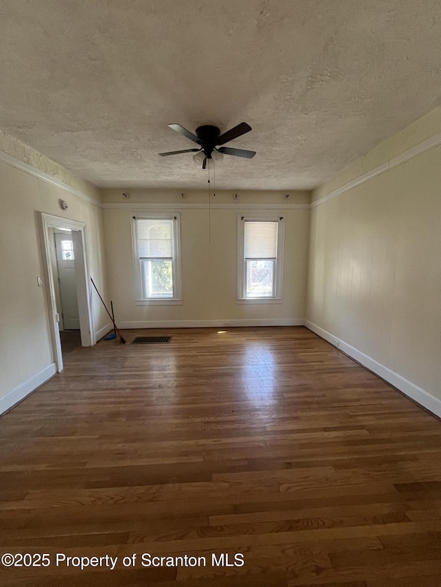 1353 Capouse 1351, Scranton, PA 18510 - unfurnished room with ceiling fan, baseboards, wood finished floors, and a textured ceiling
