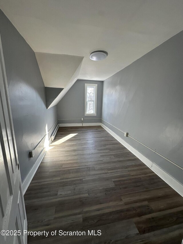 1353 Capouse 1351, Scranton, PA 18510 - additional living space with baseboards, dark wood finished floors, and vaulted ceiling