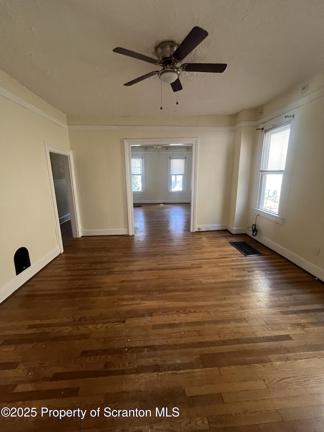 1353 Capouse 1351, Scranton, PA 18510 - empty room with wood finished floors, ceiling fan, and baseboards