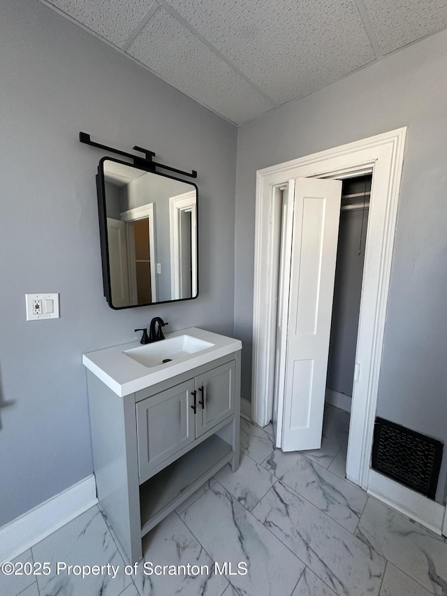 1353 Capouse 1351, Scranton, PA 18510 - bathroom featuring a paneled ceiling, baseboards, marble finish floor, and vanity