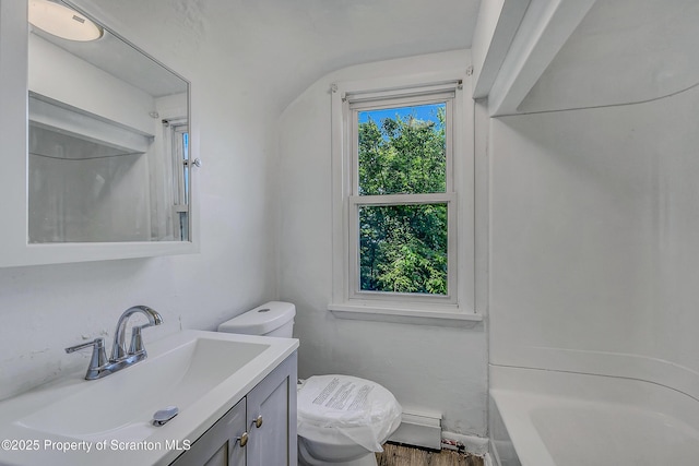 826 Moltke Ave, Scranton, PA 18505 - bathroom featuring vanity, a baseboard heating unit, and wood finished floors