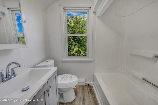 826 Moltke Ave, Scranton, PA 18505 - bathroom featuring wood finished floors, vanity, and a baseboard heating unit