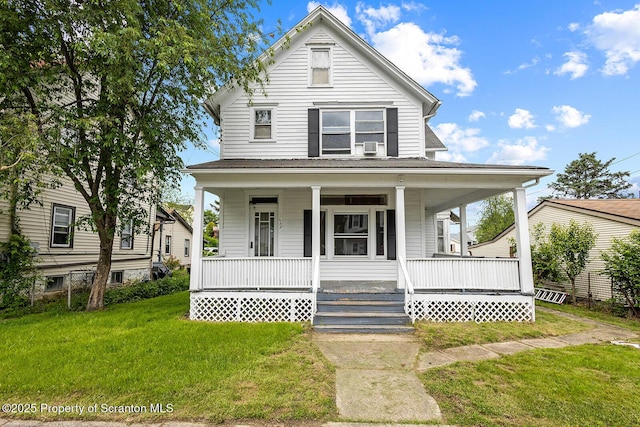 1132 Lloyd St, Scranton, PA 18508 - view of front of home with covered porch and a front lawn