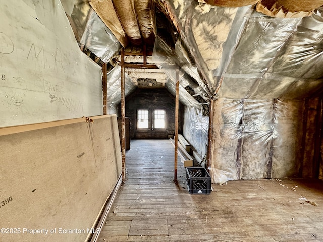 hall with lofted ceiling