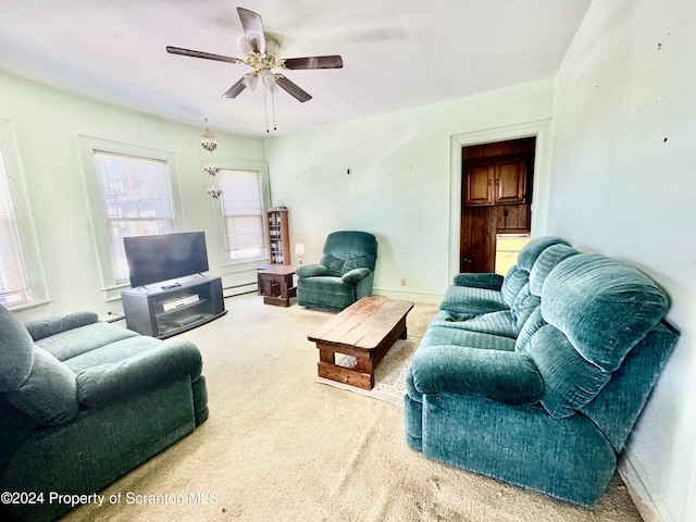 living room with ceiling fan and carpet floors